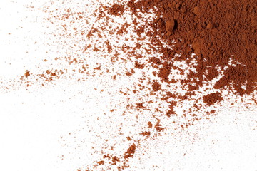 pile cocoa powder isolated on white background, top view