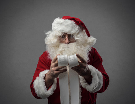 Santa Claus checking bills