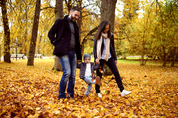 happy family in autumn city park