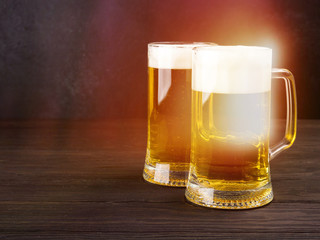 Two glass beer on wood background with copyspace