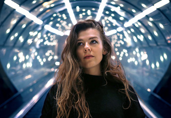 Girl in a tunnel of lights