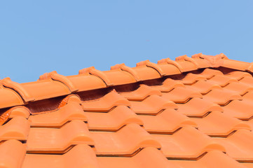 Red tile roof and clean blue sky