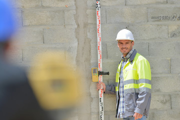 surveyor engineer making measure