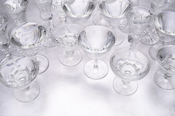 Group of drinking glasses standing on table