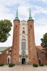Medieval Oliwa Cathedral in Gdansk, Poland, viewed from the front.