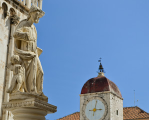 Cathedral of St. Lawrence and Clock tower of Trogir in the background. UNESCO site.