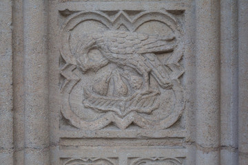 Carving of religious scene in stone of a church