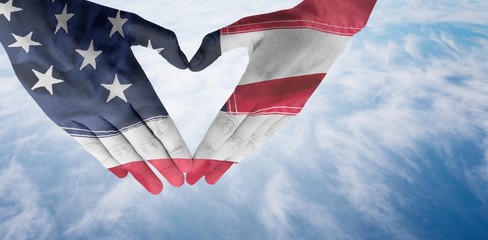 Composite image of woman making heart shape with hands
