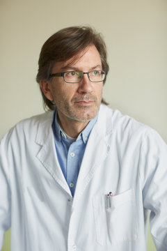 Close Up Portrait Of Male Doctor