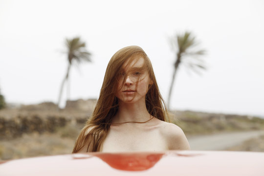 readhead young woman with messy hair