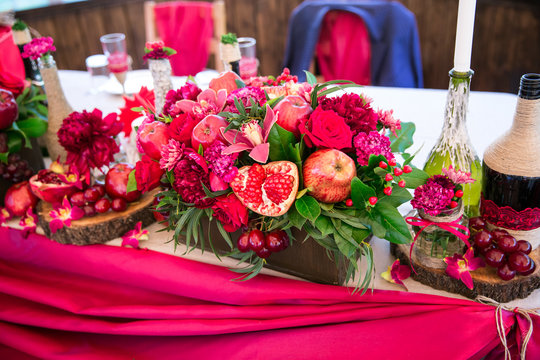 wedding tabble with red coloured cloth