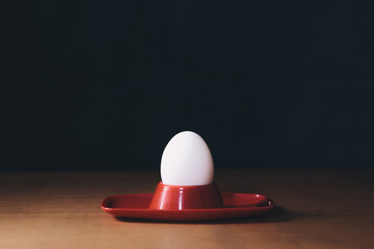 White egg and red eggcup