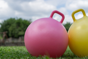 large rubber ball in the grass