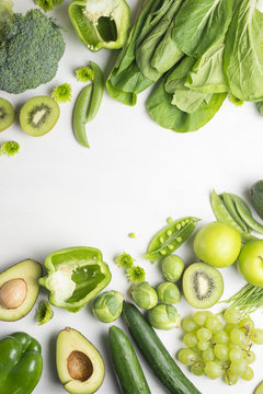Vegetables and fruits on white