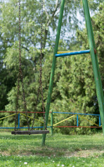 playground swing on a long chain