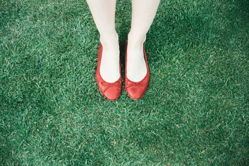 Red shoes on grass