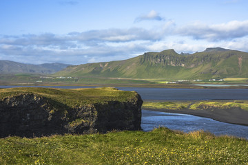 Fototapeta na wymiar Landscape of Dyrholaey cape, volcanic sand beach, South Iceland