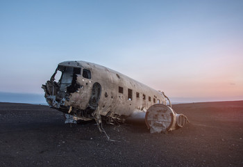 Old crashed plane abandoned on Solheimasandur beach near Vik in Iceland