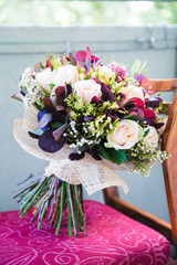 bridal wedding bouquet on the chair