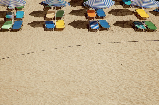beach and sun beds with copyspace