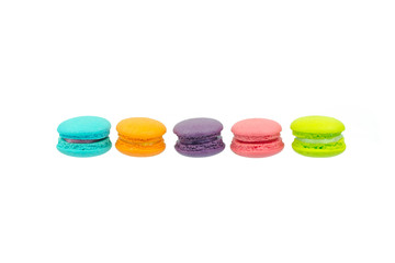 Sweet colorful macarons isolated on white background.