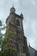 Fototapeta na wymiar Church Steeple Against Threatening Sky