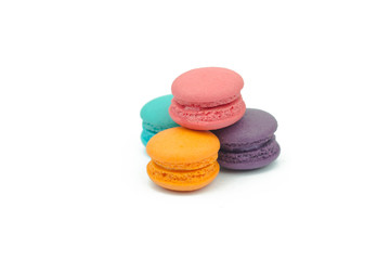 Sweet colorful macarons isolated on white background.