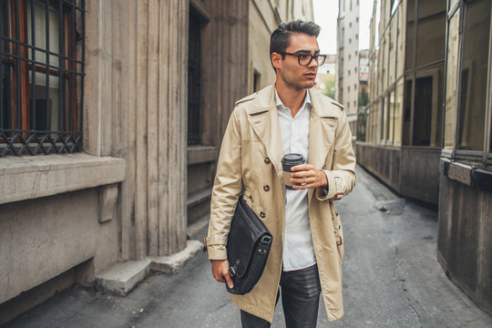 Young Business Man Walking in the Street.