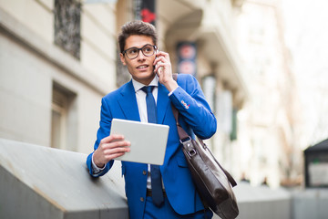 attractive businessman using a phone