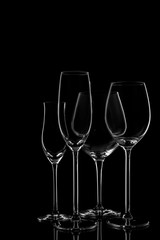 Glassware selection with wine, champagne and liquour glasses  on the dark background