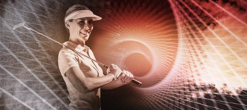 Composite image of woman golf player looking the camera 