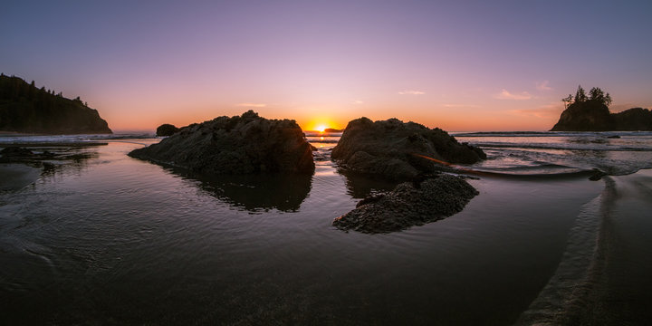 Coastal Sunset between rocks