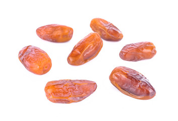 dried fruits from date palm isolated on white background