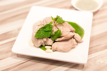 Boiled pork with garlic and dipping sauce. Thai traditional food. Thai famous food
