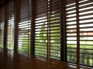 Dark interior with Window blinds at cafe selective blur focus