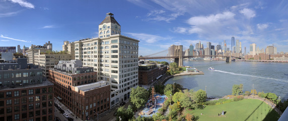 Panoramic view of Manhattan and Brooklyn skyline.