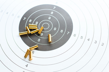 bullets on paper target for shooting practice
