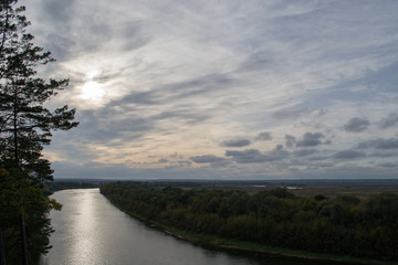 Photo of the river and beautiful gray evening sky