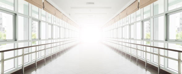 empty long corridor in the modern office building. background