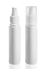 empty plastic bottle cosmetic,spay, lotion packaging on a white background