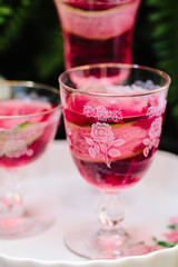 Colorful alcoholic cocktails in beautiful vintage glassware