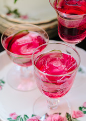 Colorful alcoholic cocktails in beautiful vintage glassware