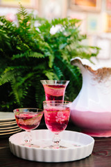 Colorful alcoholic cocktails in beautiful vintage glassware