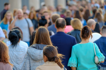 Crowd of people on the street. No recognizable faces