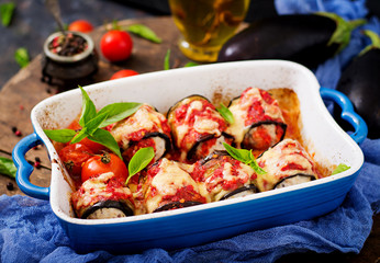 Eggplant (aubergine) rolls with meat in tomato sauce