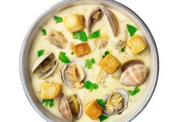 Bowl of clam chowder soup, overhead closeup, isolated