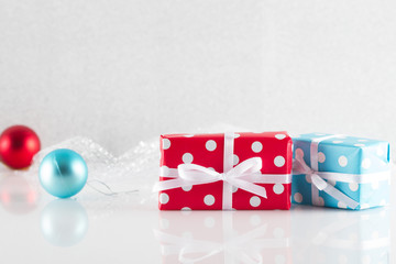 Gifts boxes with ribbons on white background