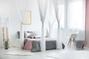 Cozy bright bedroom interior