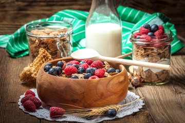 Tasty breakfast with milk and fruit.