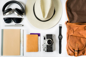 Top view of travel accessories on white table, Modern Vintage items concept